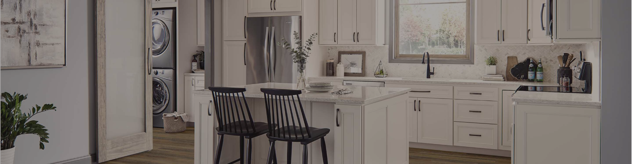 kitchen with wood-look flooring and white cabinets