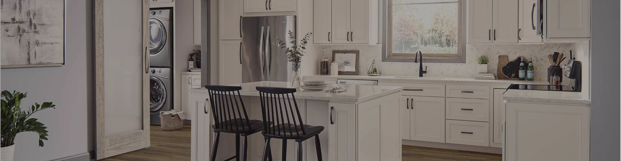 kitchen with wood-look flooring and white cabinets